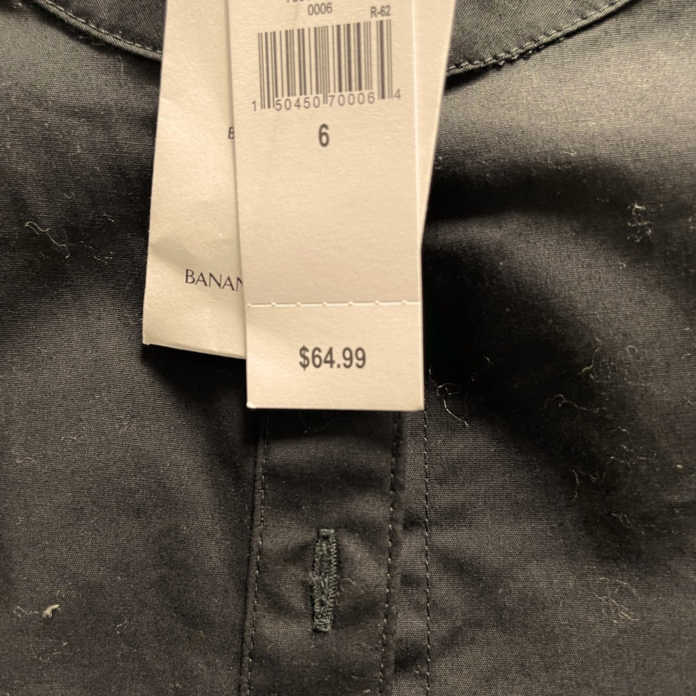 Stylish Black blouse , nice to wear under jacket at sweater .  Never worn